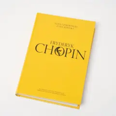 Żółta okładka książki "Fryderyk Chopin życie i twórczość" z czarnym napisem i portretem kompozytora.