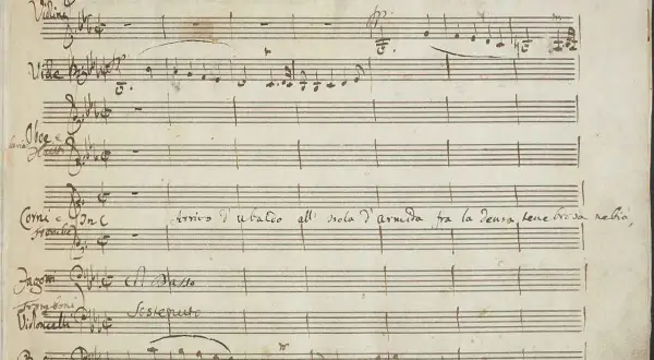 Stary rękopis nutowy, uwertura "Sinfonia in Pantomima". Widoczne instrumenty: skrzypce, obój, rogi, fagoty, wiolonczele, basy.